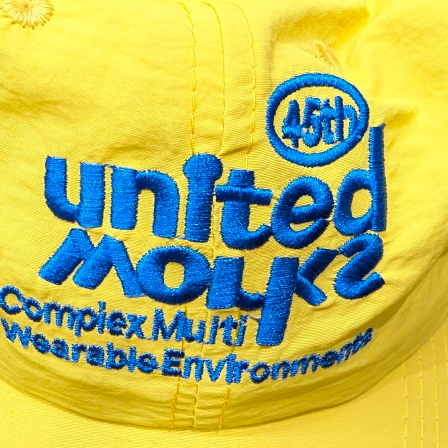 「united works」キャップ