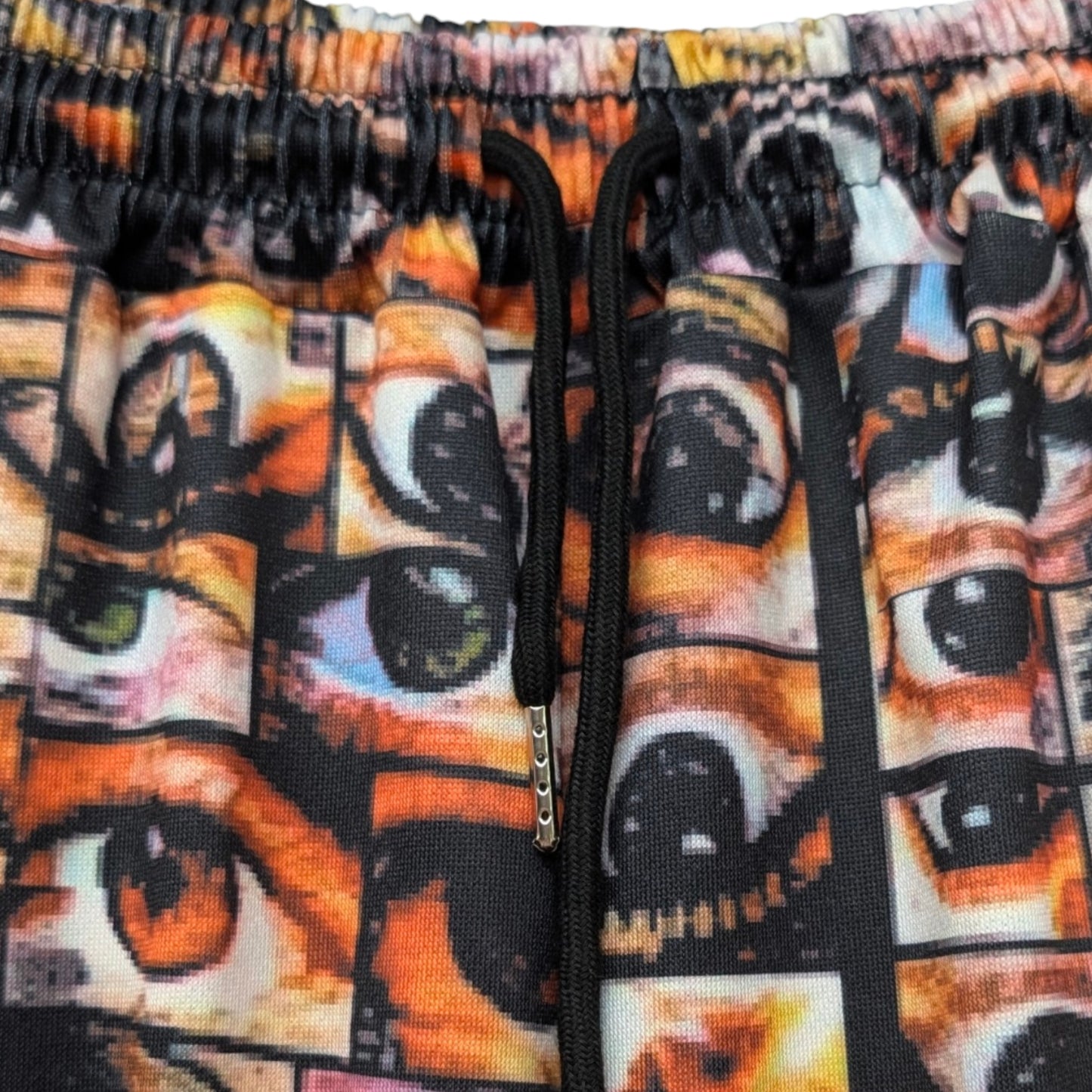 「EYE」転写プリントスウェットパンツ